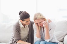 Women crying because of domestic abuse